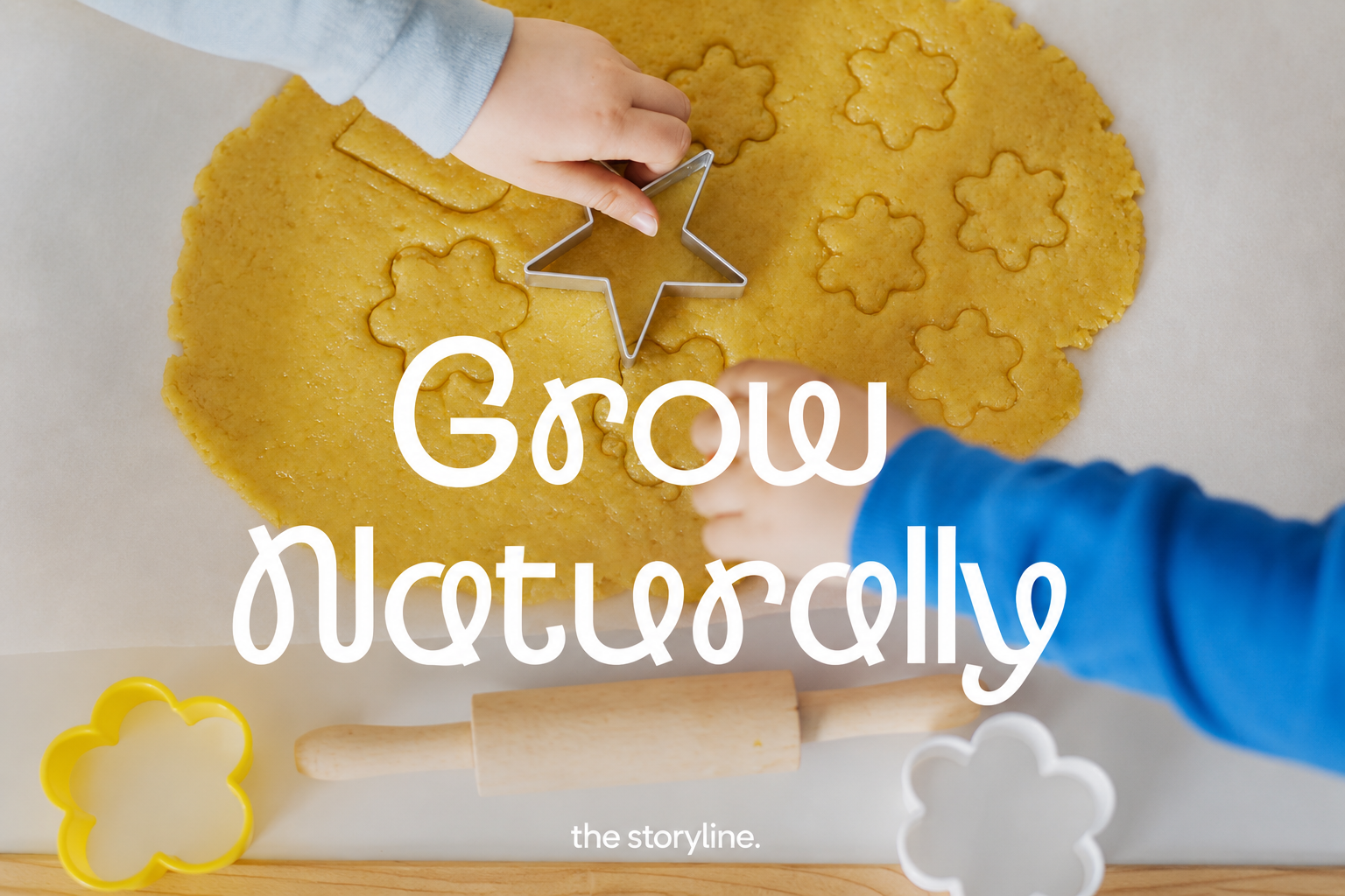 Child cutting cookie shapes at The Storyline
